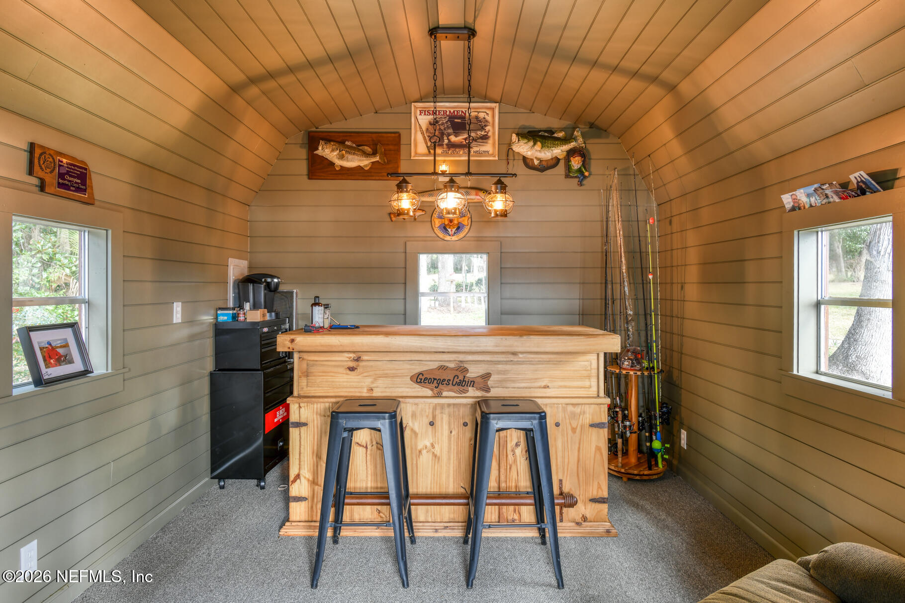 131 Whitney Street Satsuma, FL 32189 - Photo 47 of 75 a view of a dining room with furniture and chandelier