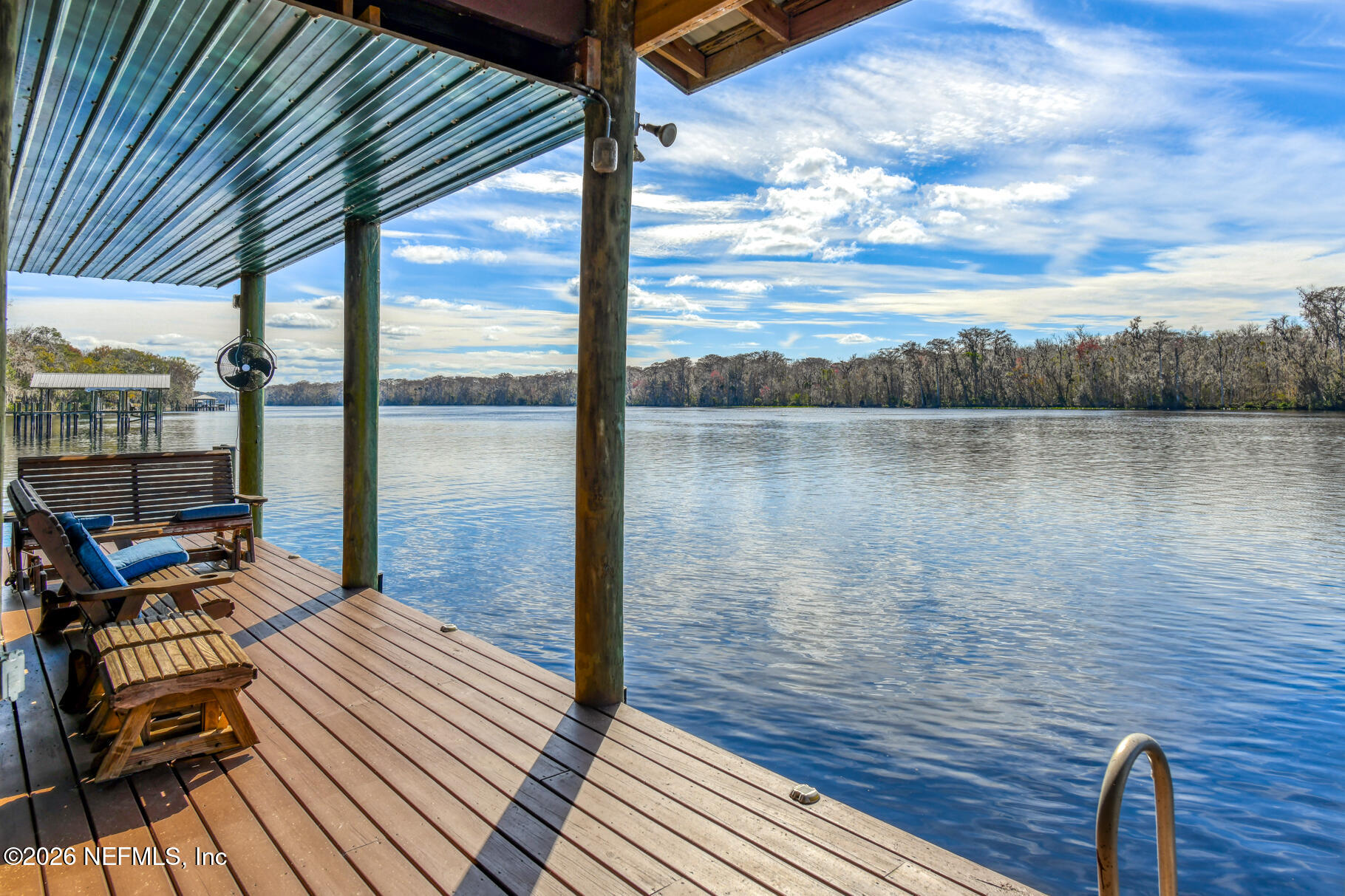 131 Whitney Street Satsuma, FL 32189 - Photo 56 of 75 a view of a balcony with lake view and mountain view