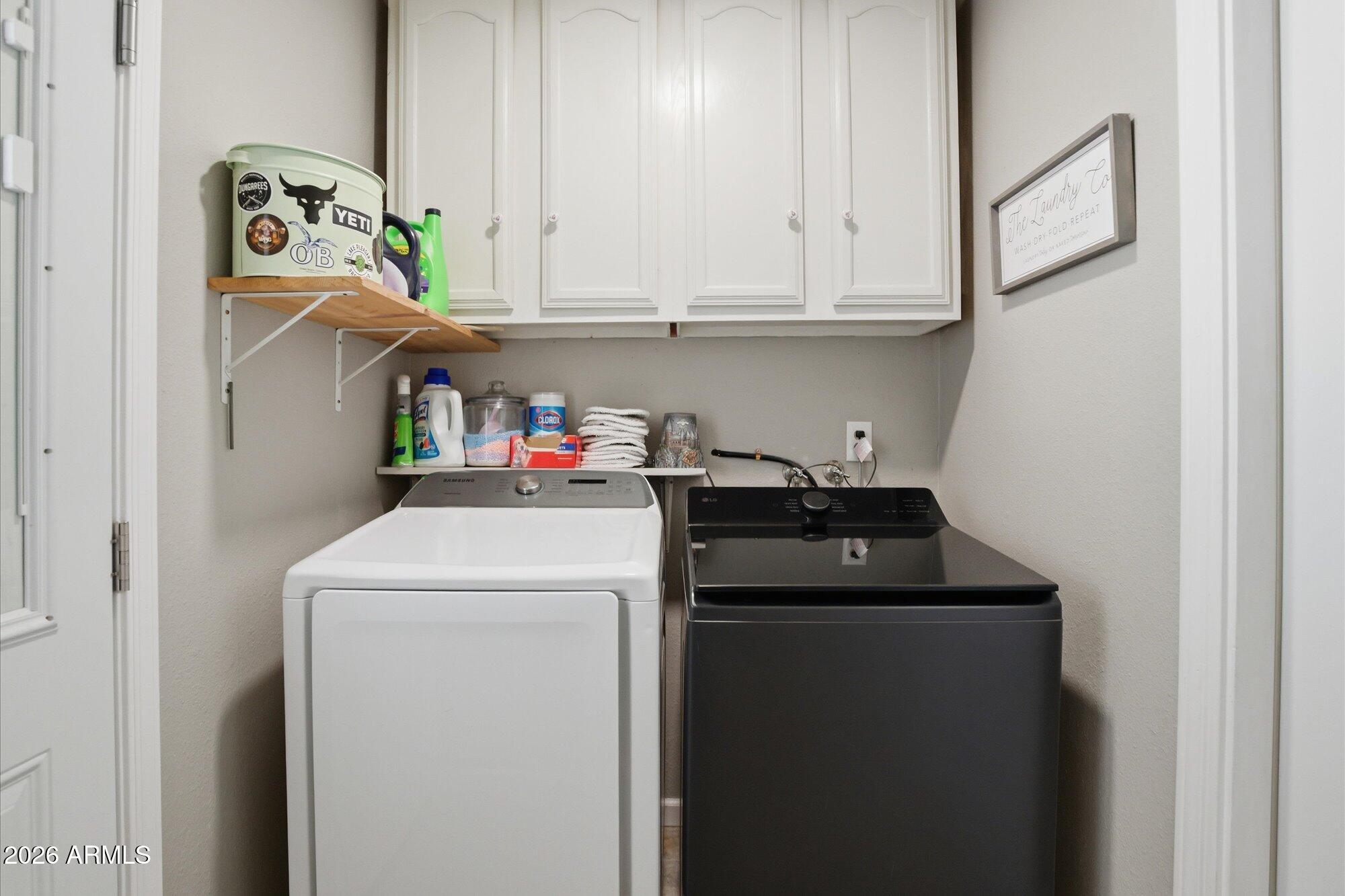 2222 West Maple Drive Phoenix, AZ 85027 - Photo 28 of 32 a utility room with dryer and washer
