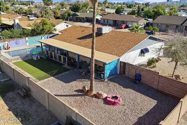 view of living room with furniture and flowers