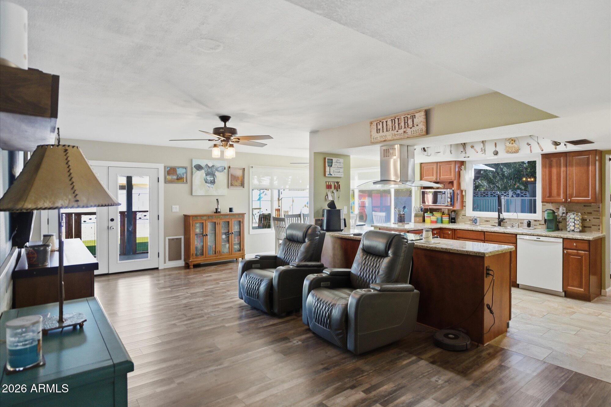 2222 West Maple Drive Phoenix, AZ 85027 - Photo 4 of 32 a living room with furniture and a wooden floor