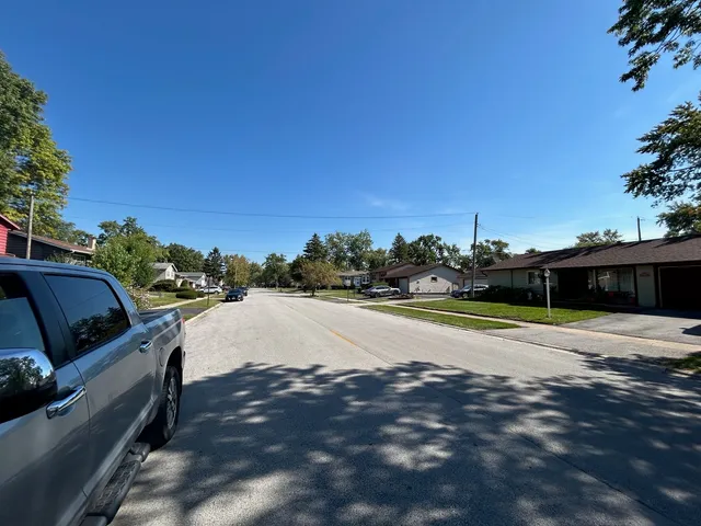 a view of a street with houses