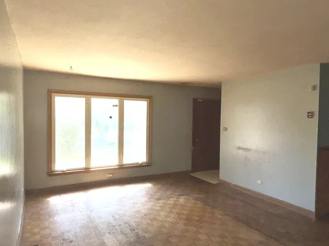 an empty room with a window