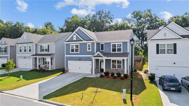 front view of a house with a swimming pool