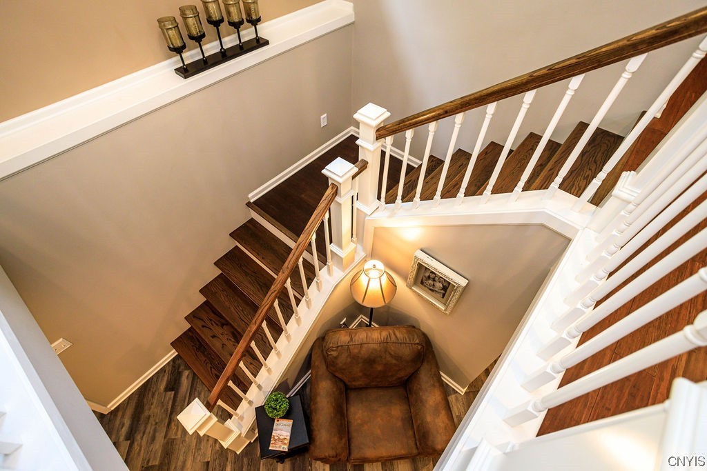 1399 Berry Road Fabius, NY 13084 - Photo 21 of 49 Custom staircase leading to lower level.