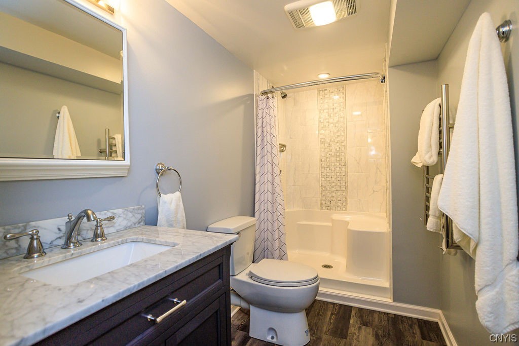 1399 Berry Road Fabius, NY 13084 - Photo 28 of 49 Full bathroom with towel warmer.