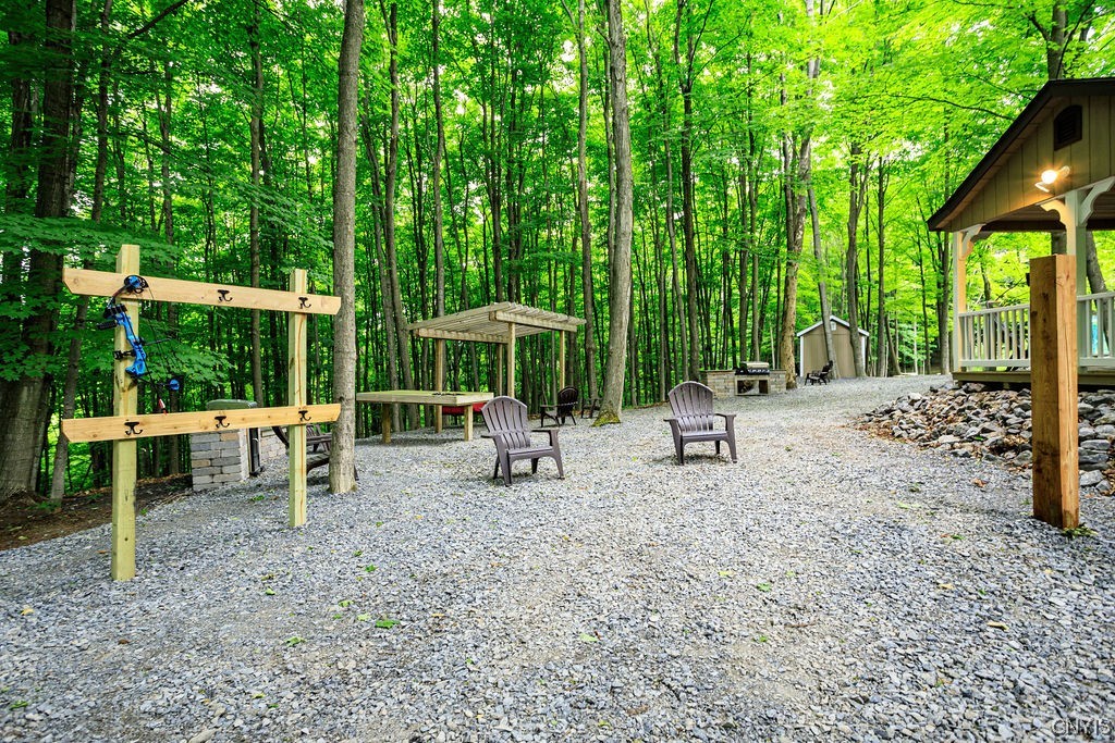 1399 Berry Road Fabius, NY 13084 - Photo 48 of 49 Another gathering space with grills outside of cab