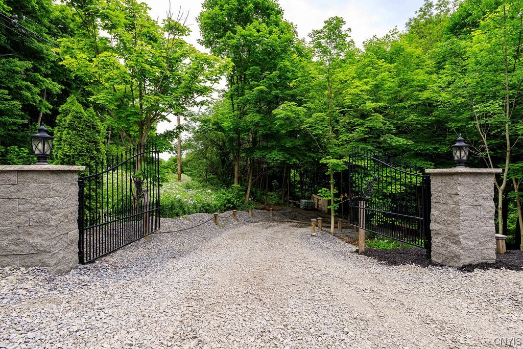1399 Berry Road Fabius, NY 13084 - Photo 49 of 49 Cool custom gated entry to the lower level. There