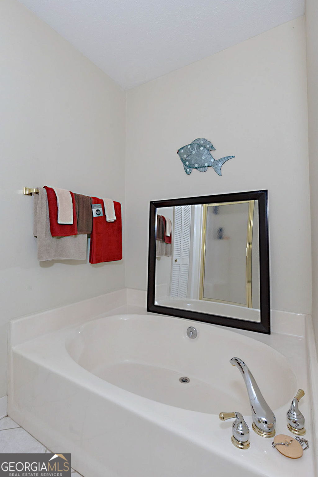 994 Highway 315 Fortson, GA 31808 - Photo 20 of 46 a bathroom with a bathtub and a sink