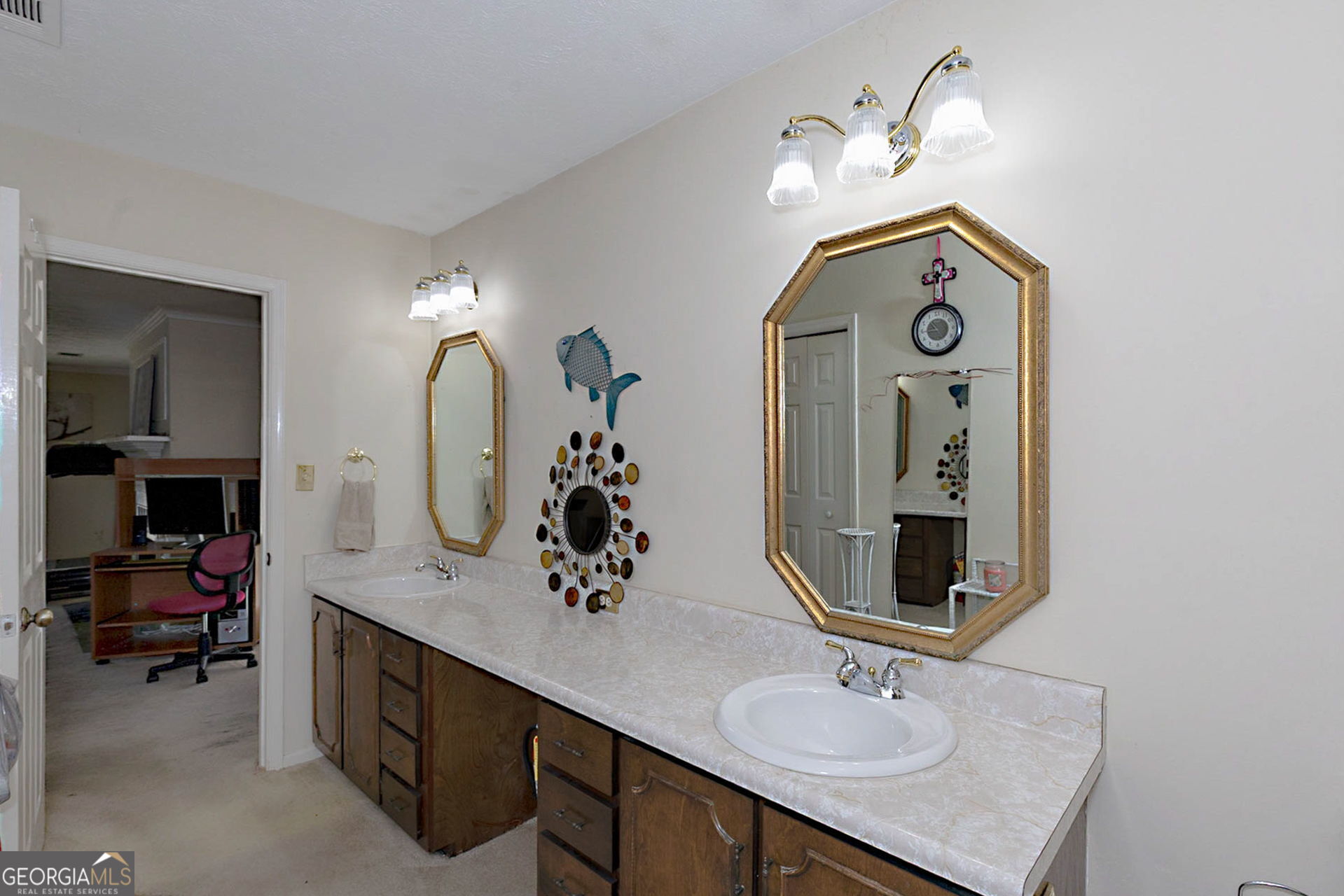 994 Highway 315 Fortson, GA 31808 - Photo 21 of 46 a bathroom with double vanity sinks and a mirror