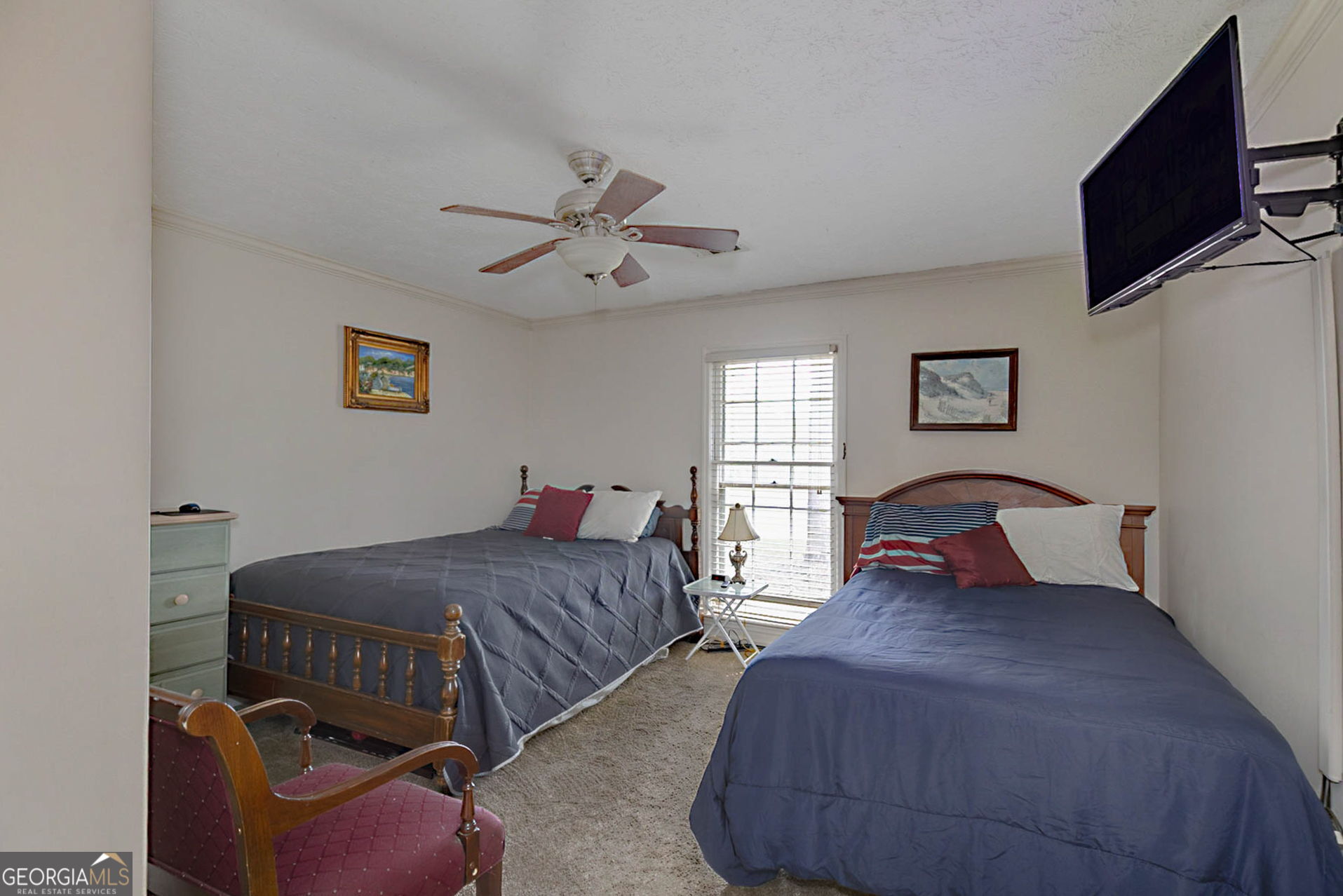 994 Highway 315 Fortson, GA 31808 - Photo 22 of 46 a bedroom with two beds and a flat screen tv