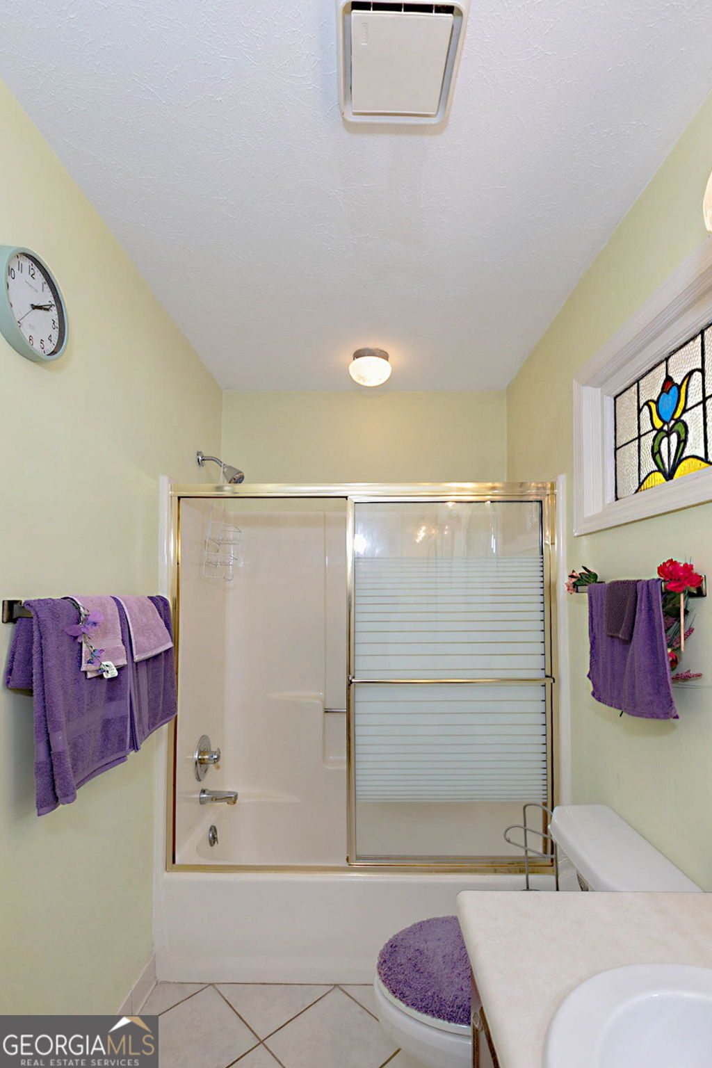 994 Highway 315 Fortson, GA 31808 - Photo 23 of 46 a bathroom with a tub shower and mirror