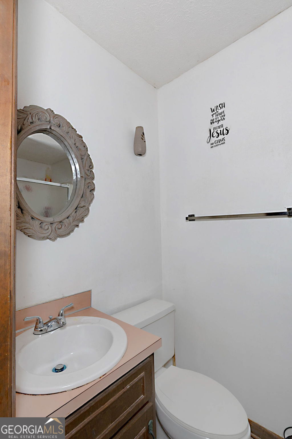 994 Highway 315 Fortson, GA 31808 - Photo 27 of 46 a bathroom with a sink and a mirror