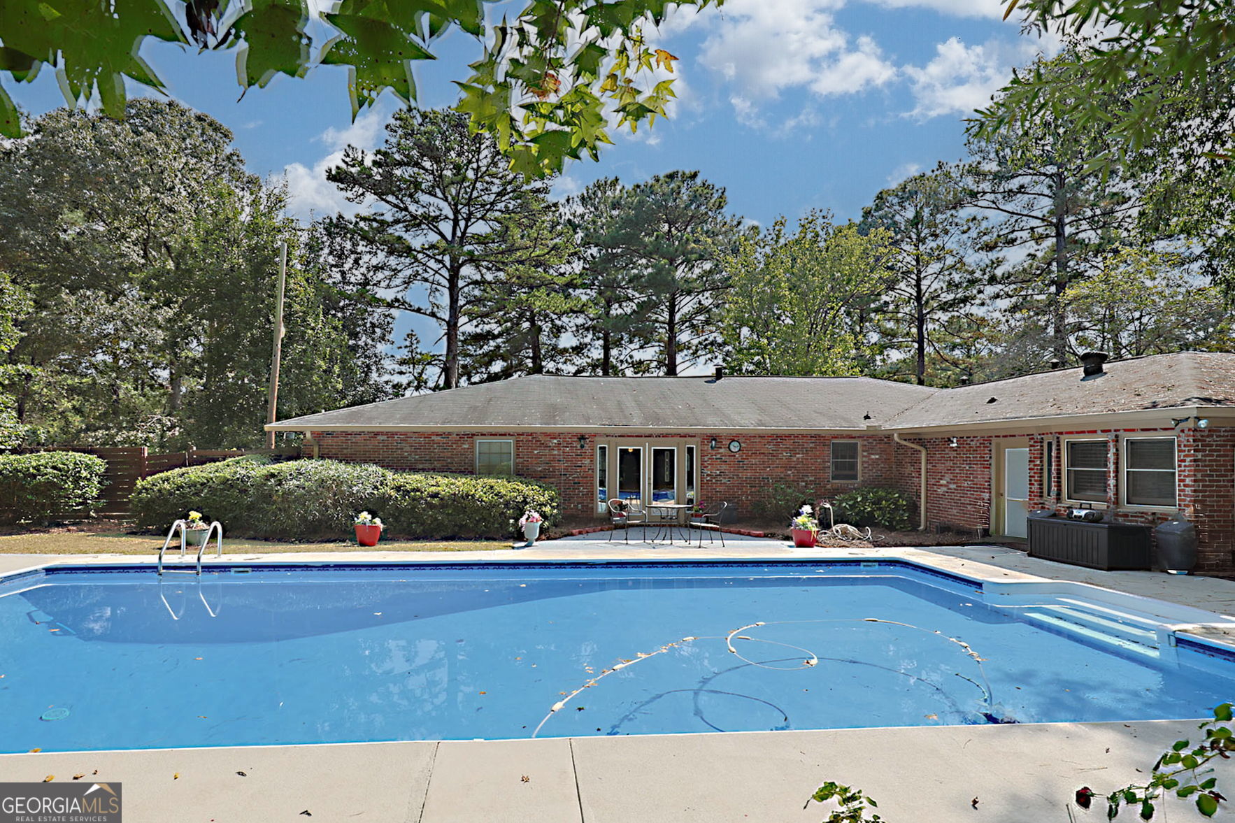 994 Highway 315 Fortson, GA 31808 - Photo 32 of 46 an outdoor view of the house with swimming pool