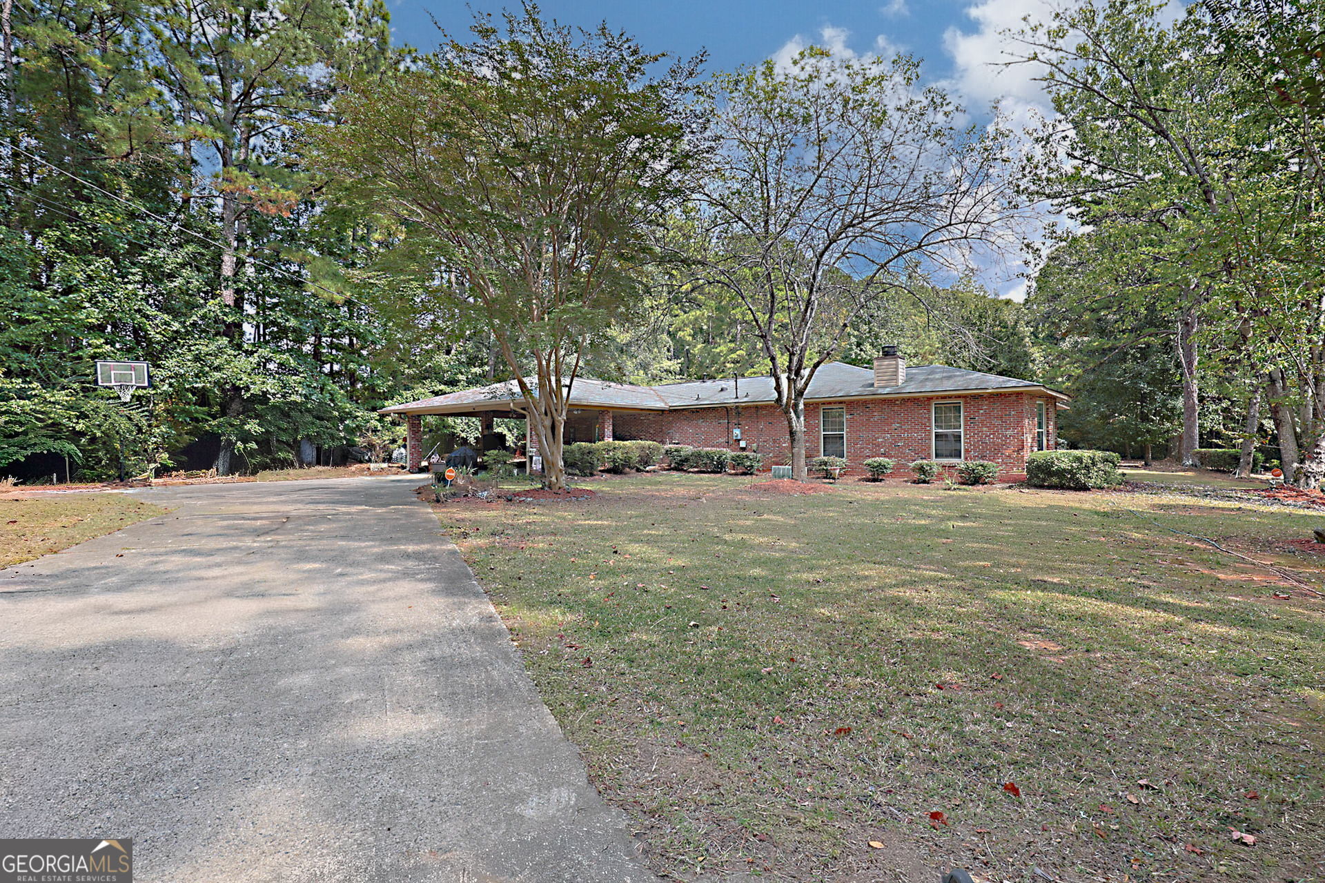 994 Highway 315 Fortson, GA 31808 - Photo 5 of 46 a front view of a house with garden