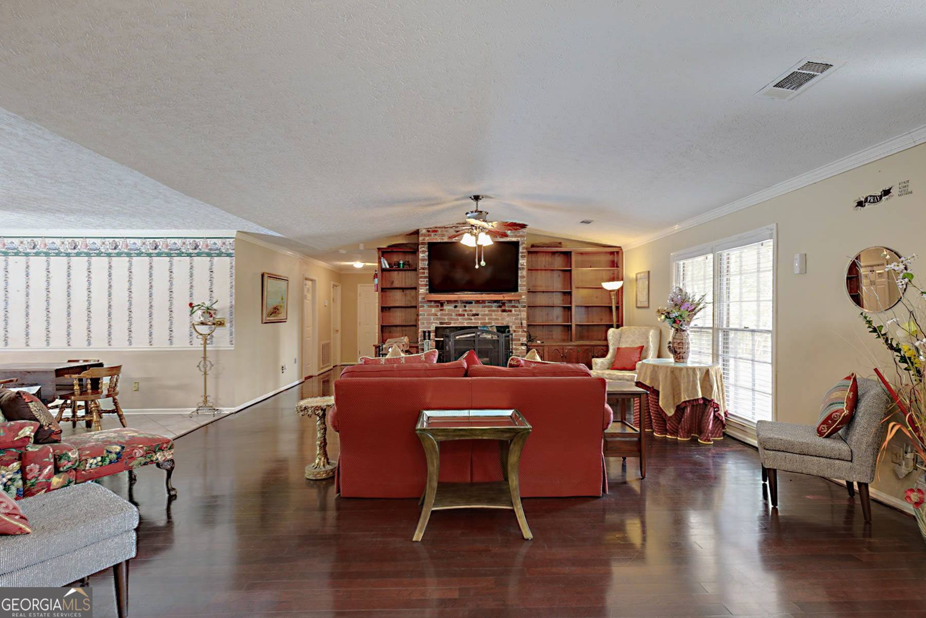 994 Highway 315 Fortson, GA 31808 - Photo 7 of 46 a view of a dining room with furniture window and wooden floor