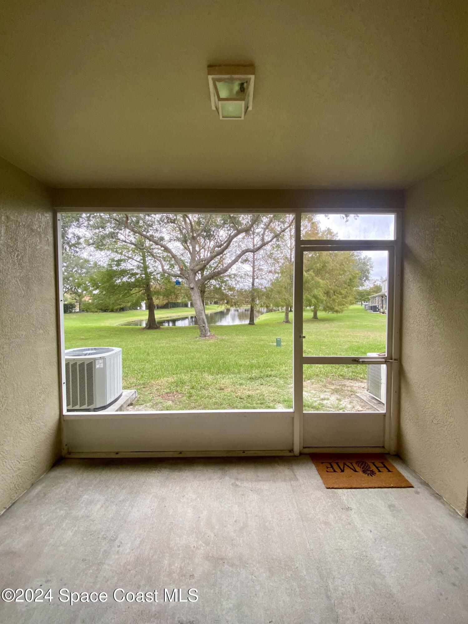 1420 Hampton Park Lane Melbourne, FL 32940 - Photo 14 of 20 a view of an outdoor space and a window