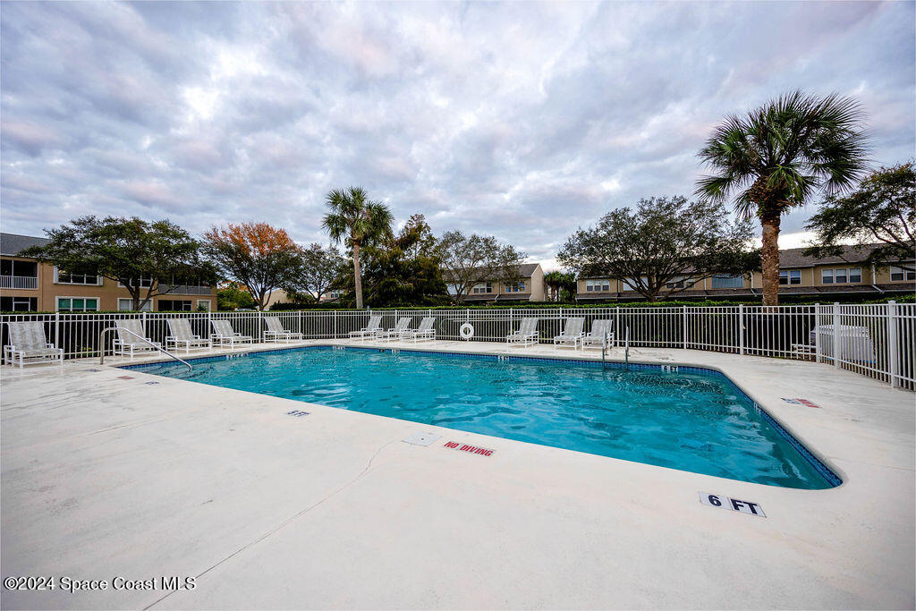 1420 Hampton Park Lane Melbourne, FL 32940 - Photo 18 of 20 a view of swimming pool with a yard