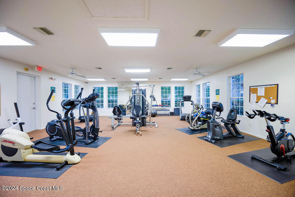 1420 Hampton Park Lane Melbourne, FL 32940 - Photo 20 of 20 a view of a room with gym equipment