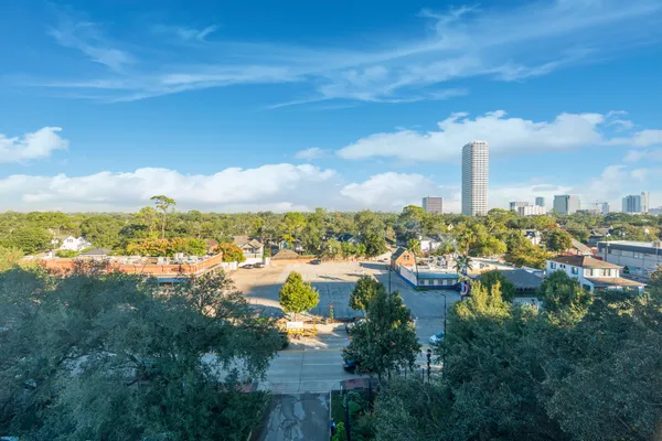 a view of a lake with a city