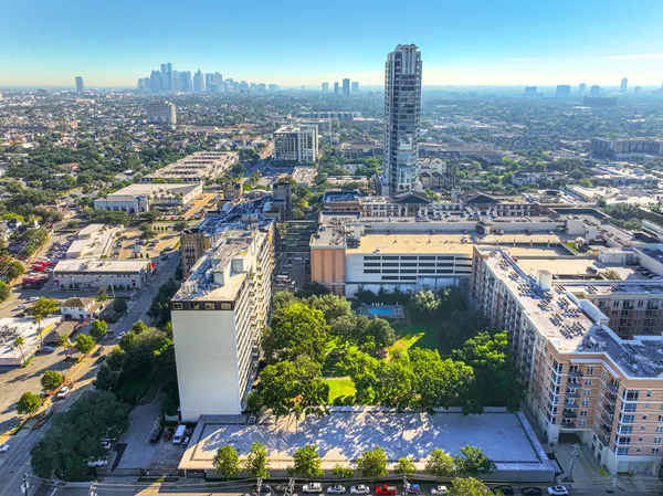 a view of a city with tall buildings