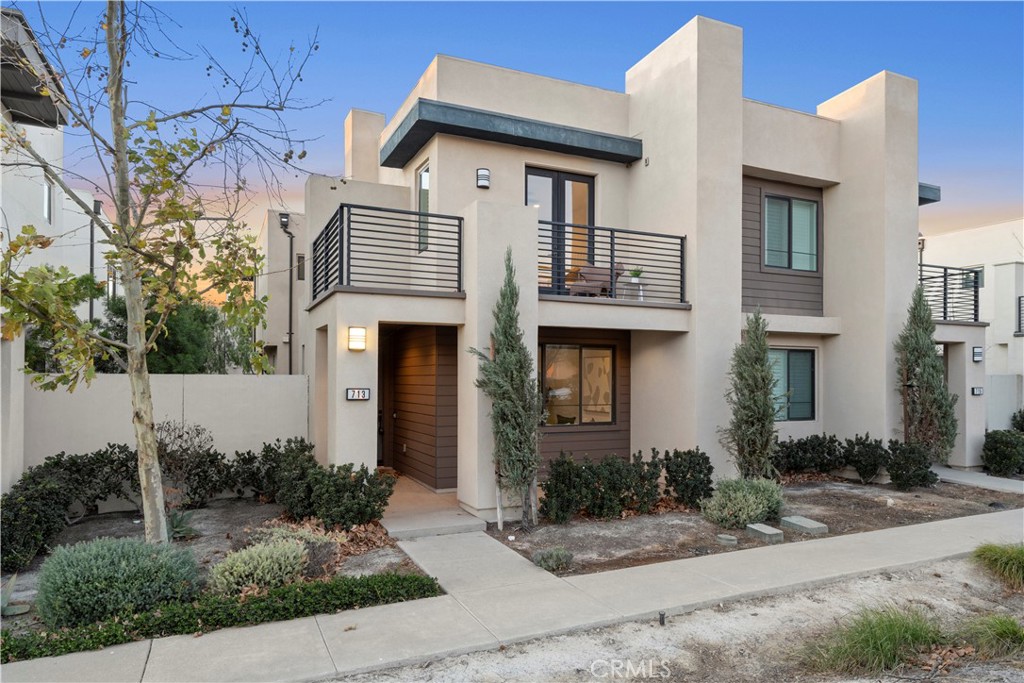 713 Beacon Irvine, CA 92618 - Photo 1 of 1 a front view of a house with garden