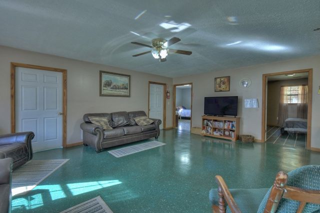 a white toilet sitting next to a bathroom sink