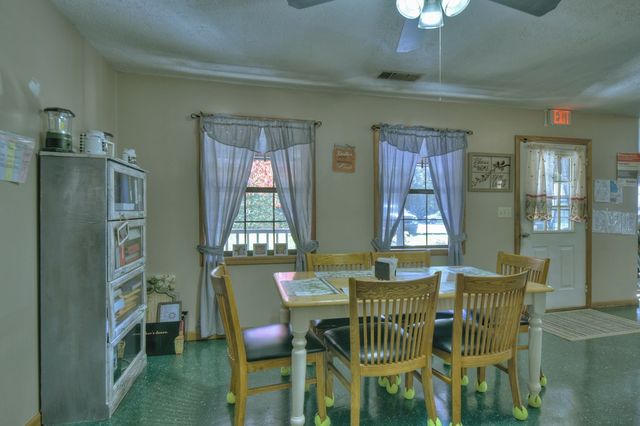 a view of kitchen with dining area