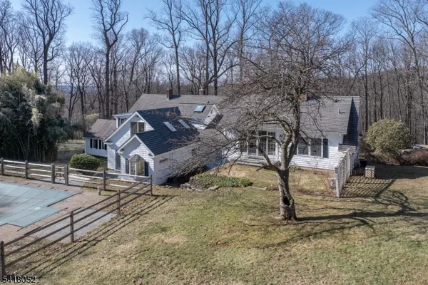 an aerial view of residential house with outdoor space