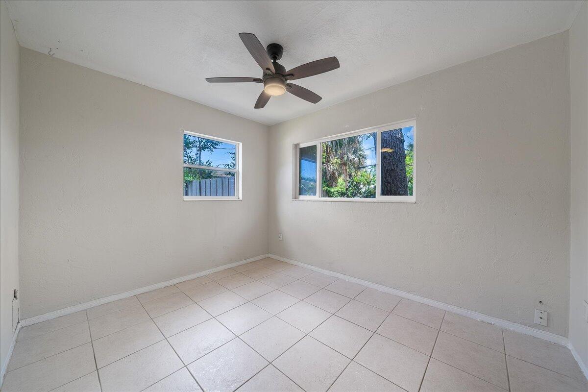 441 Sharon Drive Melbourne, FL 32935 - Photo 14 of 25 a view of empty room with window