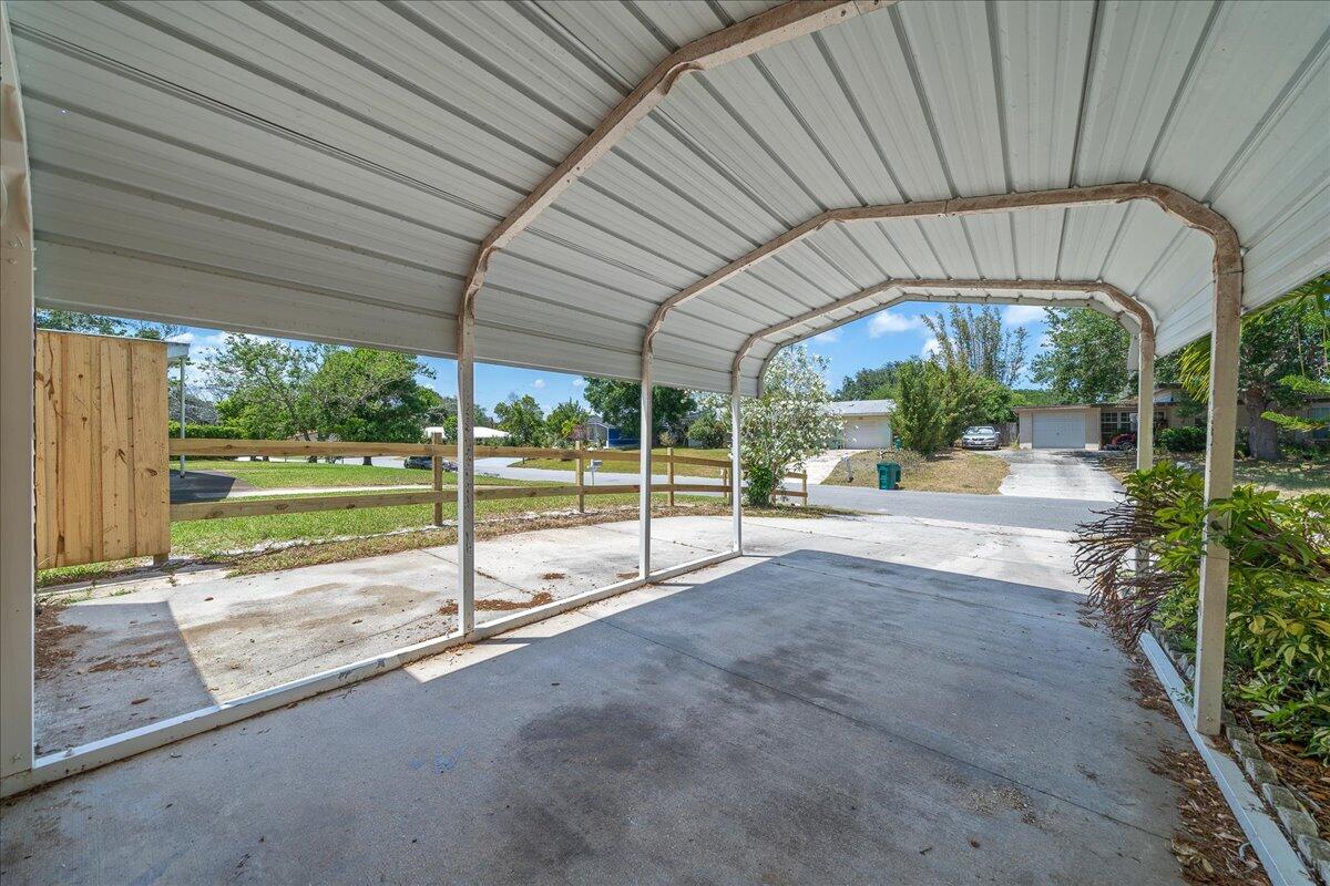 441 Sharon Drive Melbourne, FL 32935 - Photo 18 of 25 a view of a house with backyard and porch