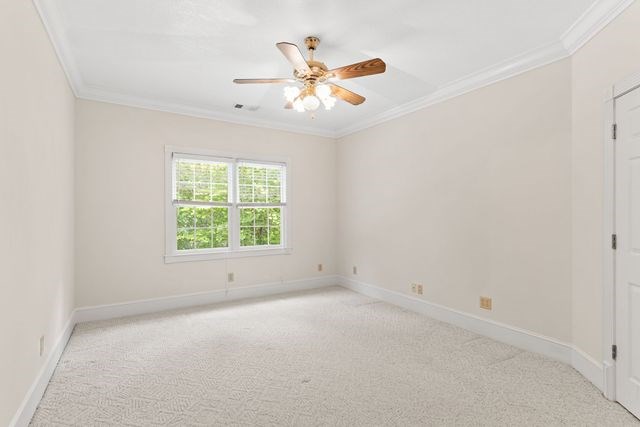 1190 Maple Grove Road Morganton, GA 30560 - Photo 63 of 96 an empty room with a window and a ceiling fan