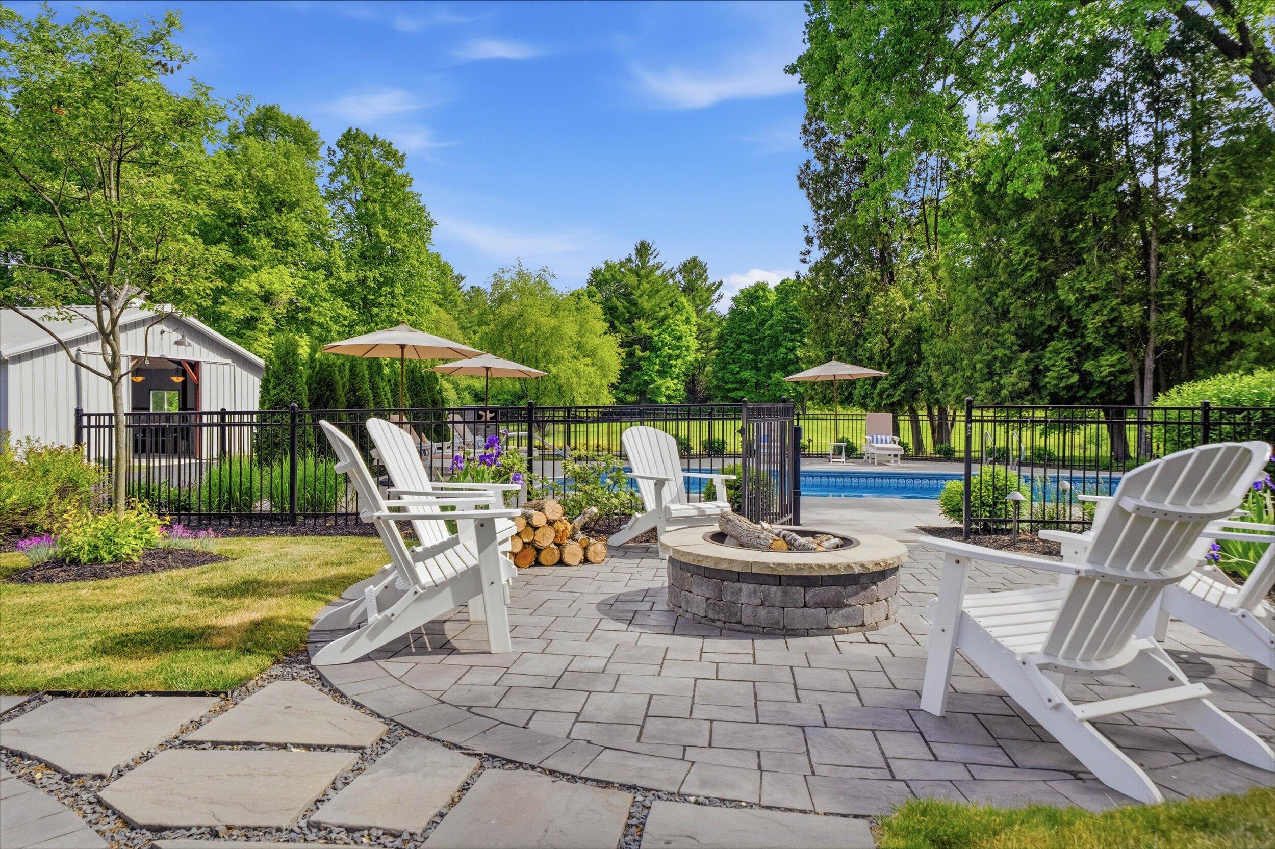 9431 Hawthorne Road Mequon, WI 53097 - Photo 45 of 67 Patio with firepit