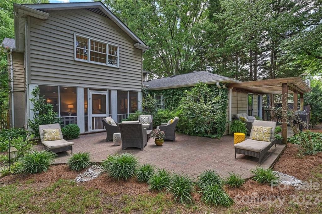 3100 Clarendon Road Charlotte, NC 28211 - Photo 40 of 48 a view of a house with a backyard and sitting area