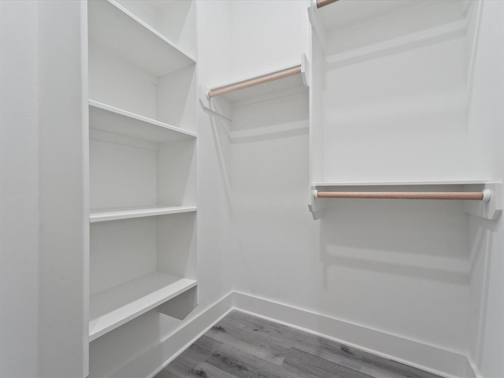 4012 Northfield Lane Houston, TX 77092 - Photo 12 of 17 a view of an empty walk in closet