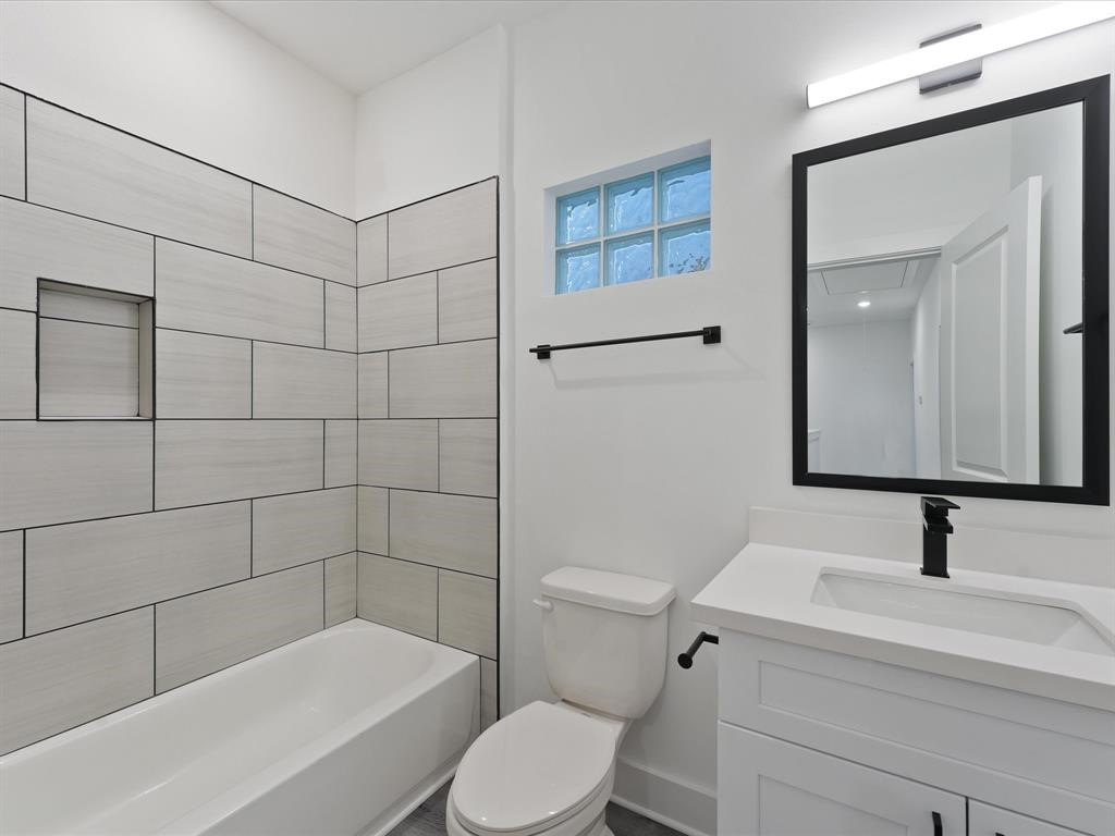 4012 Northfield Lane Houston, TX 77092 - Photo 15 of 17 a bathroom with a sink toilet and shower