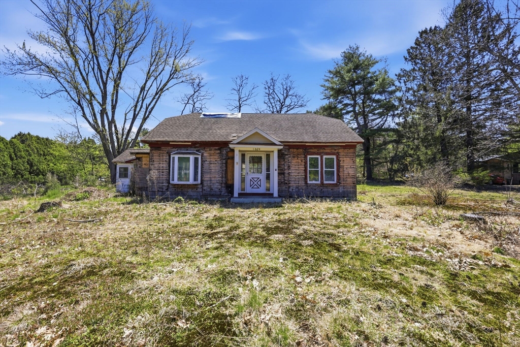 1024 Westhampton Road Northampton, MA 01062 - Photo 2 of 23 a front view of a house with a garden