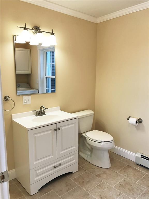 51 Dr Mann Road Augusta, ME 04330 - Photo 15 of 35 There is a 1/2 bath and laundry room...