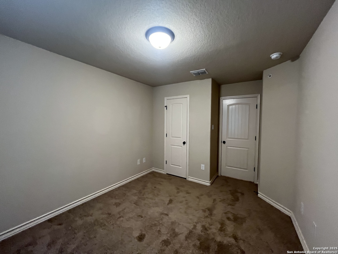 6514 Marcel Way, Unit 103 San Antonio, TX 78233 - Photo 22 of 28 a view of an empty room