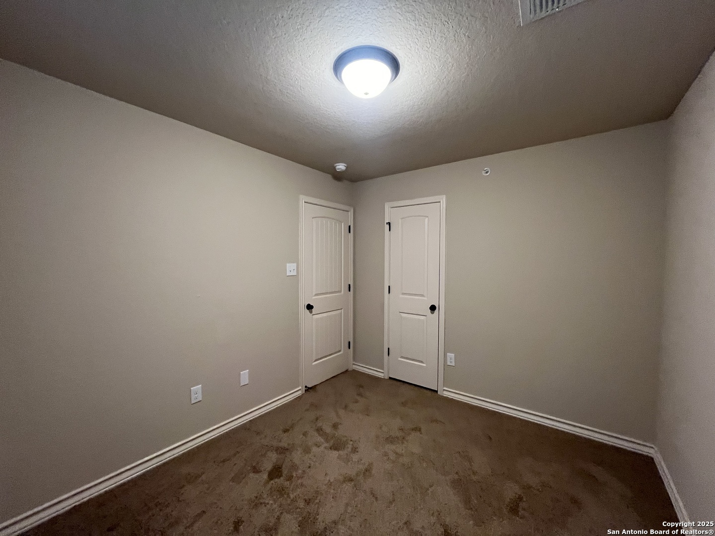 6514 Marcel Way, Unit 103 San Antonio, TX 78233 - Photo 25 of 28 a view of an empty room