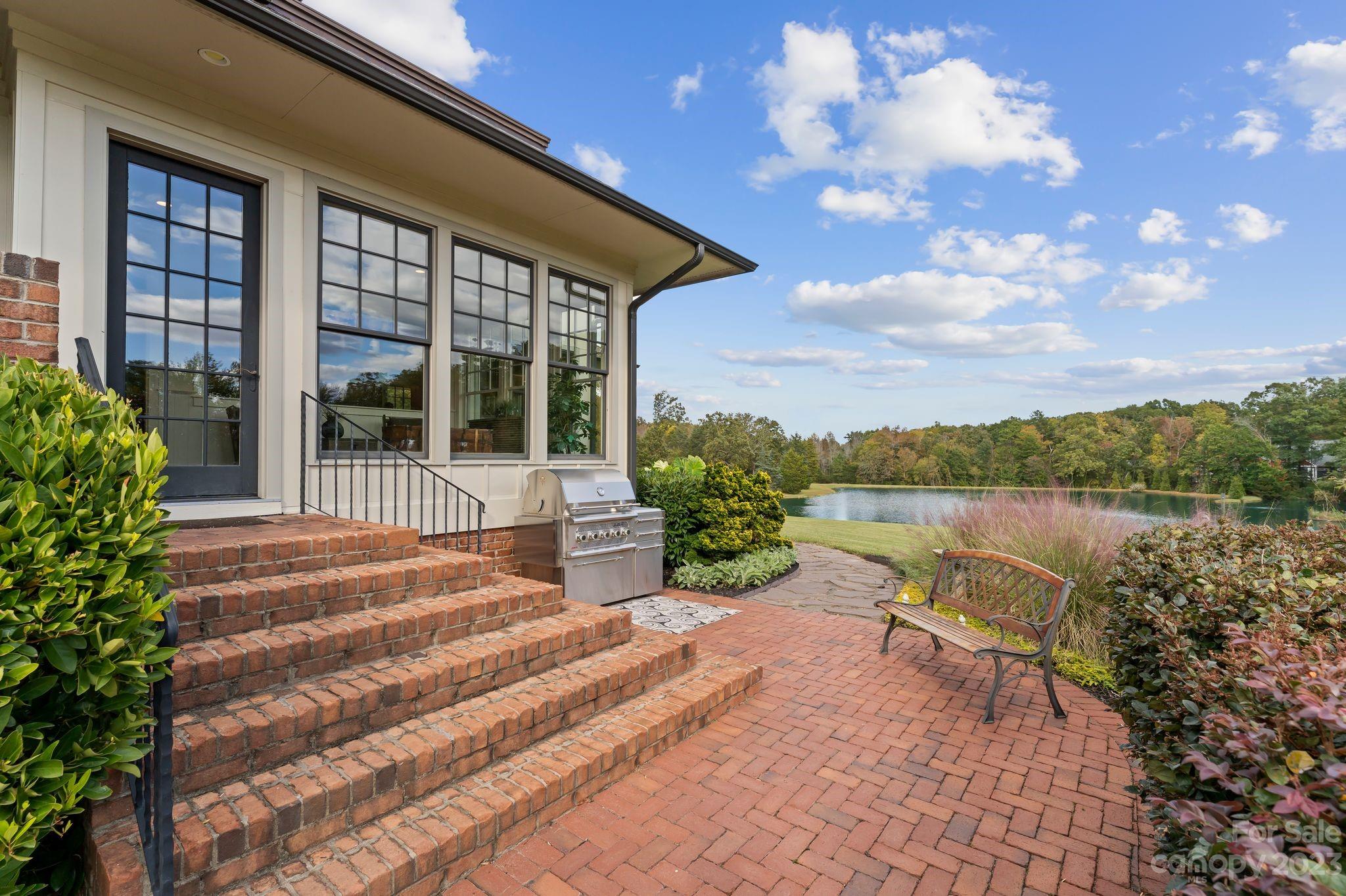 13500 Cabarrus Station Road Midland, NC 28107 - Photo 11 of 48 a house with garden in front of it