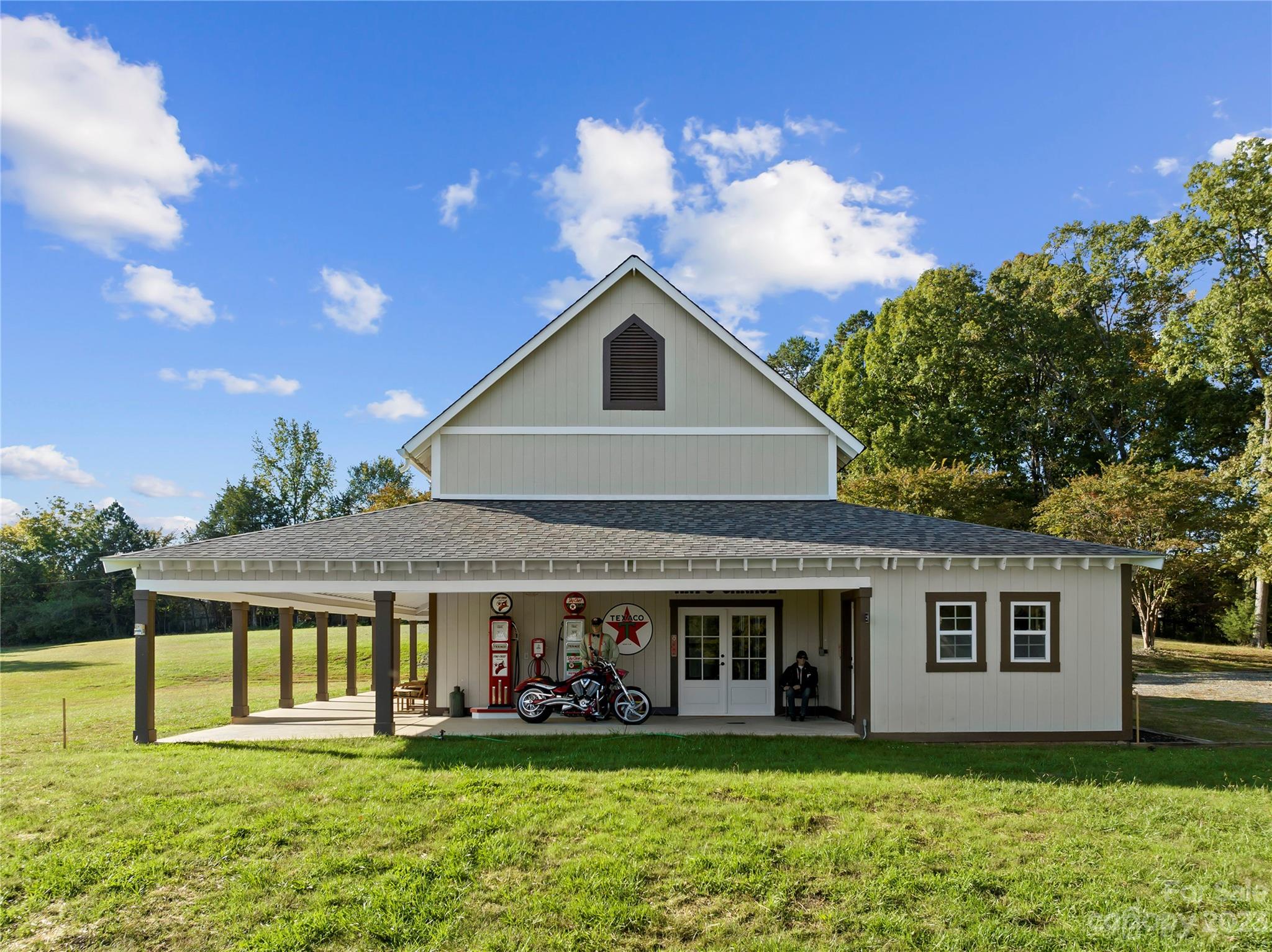 13500 Cabarrus Station Road Midland, NC 28107 - Photo 12 of 48 a front view of a house with a yard