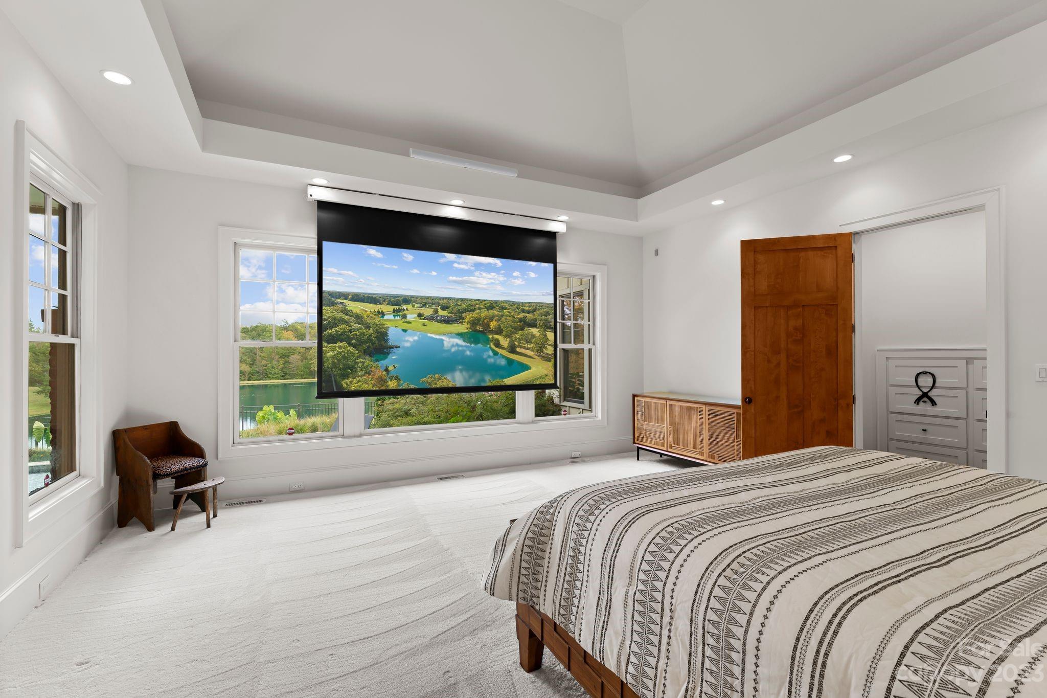 13500 Cabarrus Station Road Midland, NC 28107 - Photo 23 of 48 a bedroom with a bed and a large window