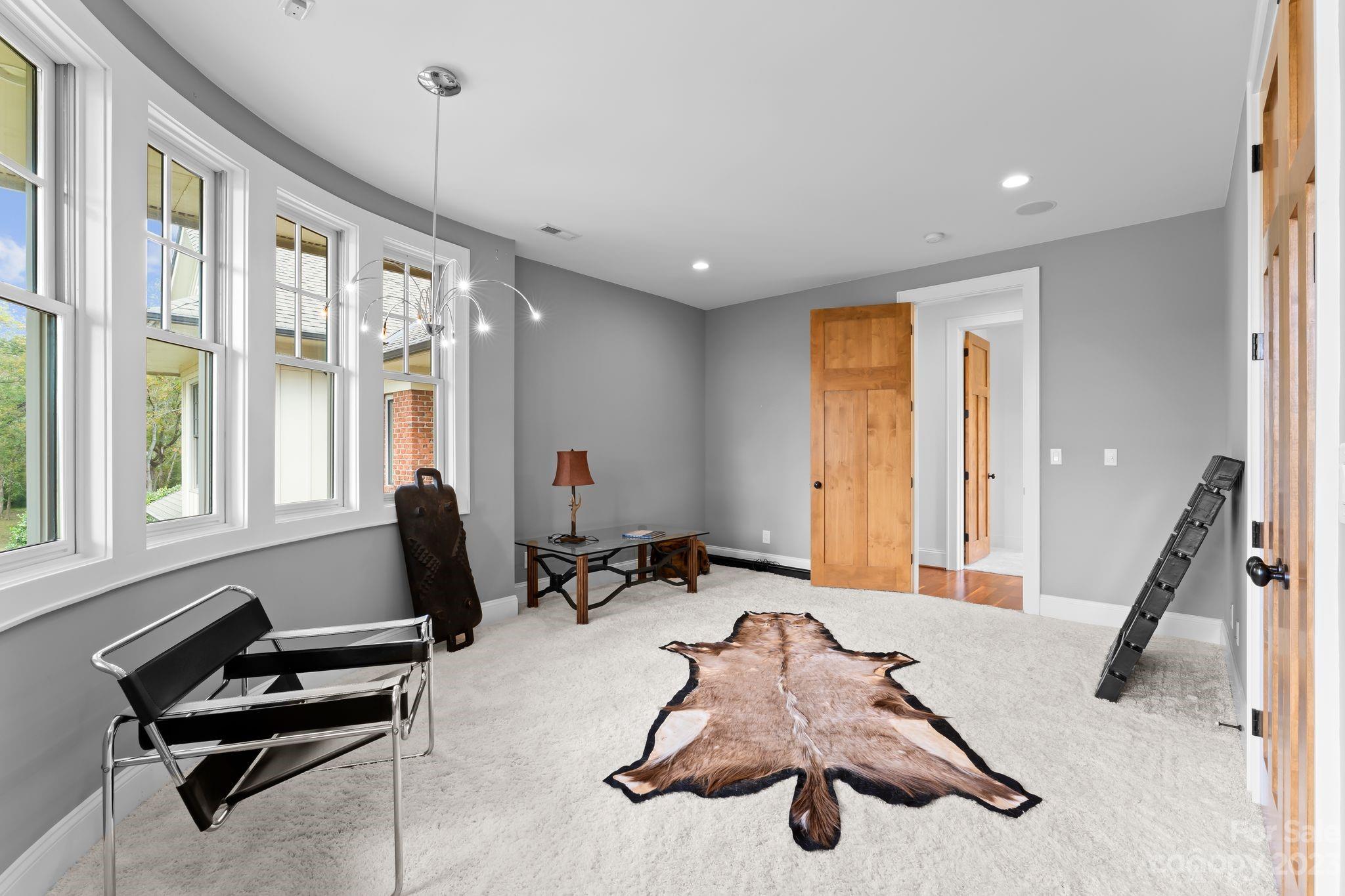 13500 Cabarrus Station Road Midland, NC 28107 - Photo 35 of 48 a room with furniture and windows