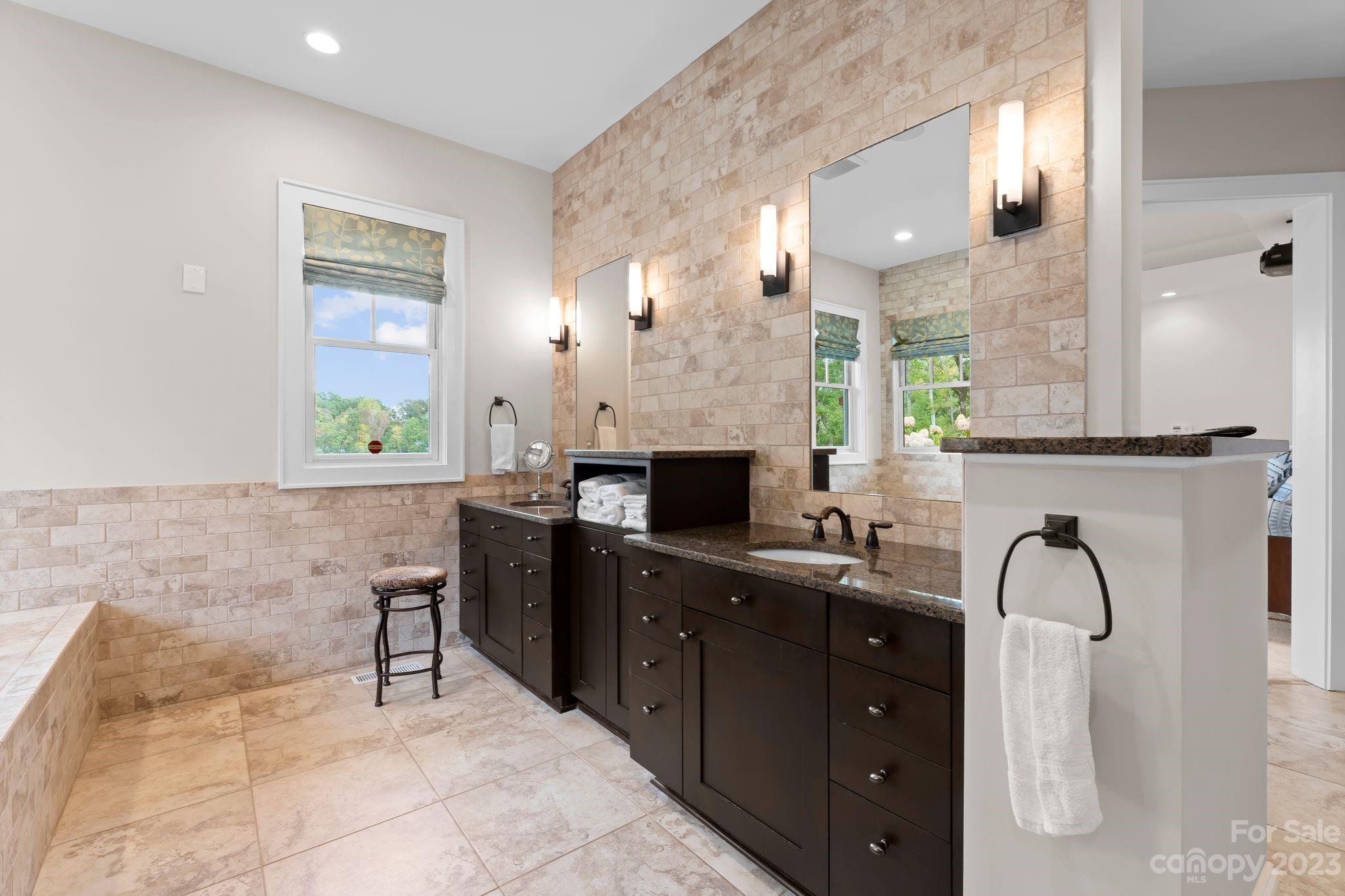 13500 Cabarrus Station Road Midland, NC 28107 - Photo 39 of 48 a kitchen with a sink cabinets and window