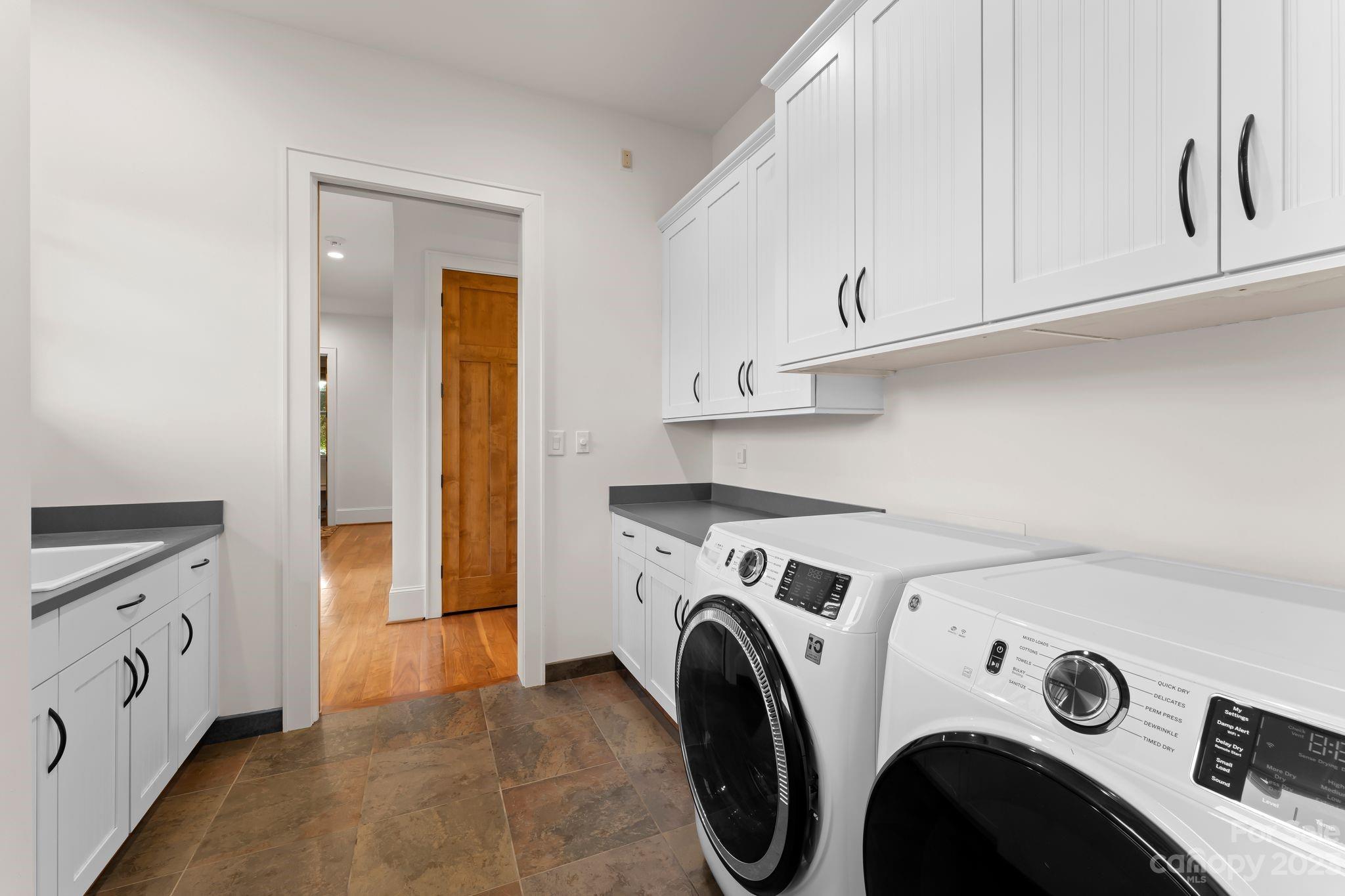 13500 Cabarrus Station Road Midland, NC 28107 - Photo 42 of 48 a utility room with dryer and washer