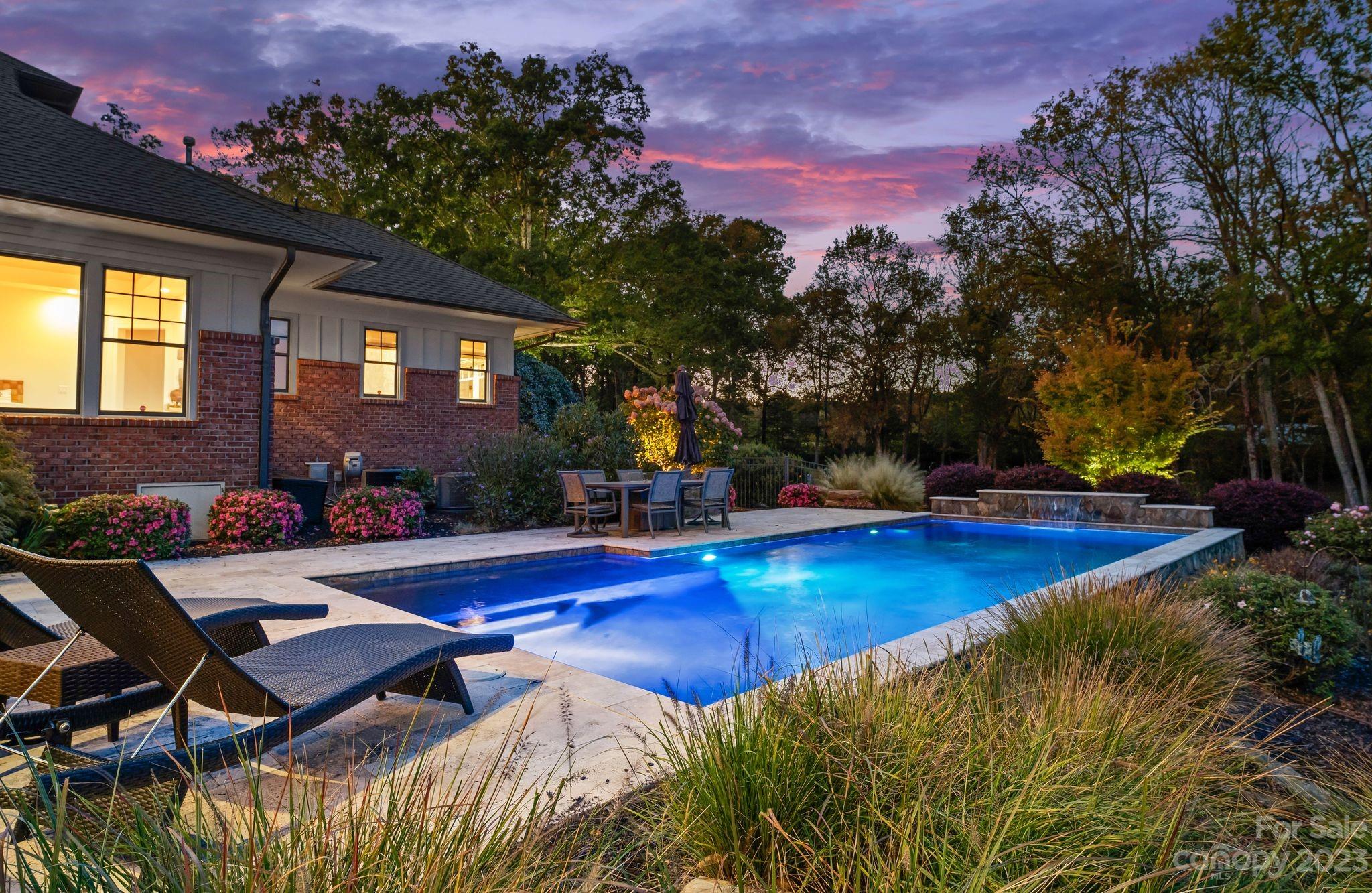 13500 Cabarrus Station Road Midland, NC 28107 - Photo 46 of 48 a view of swimming pool with outdoor seating and a garden