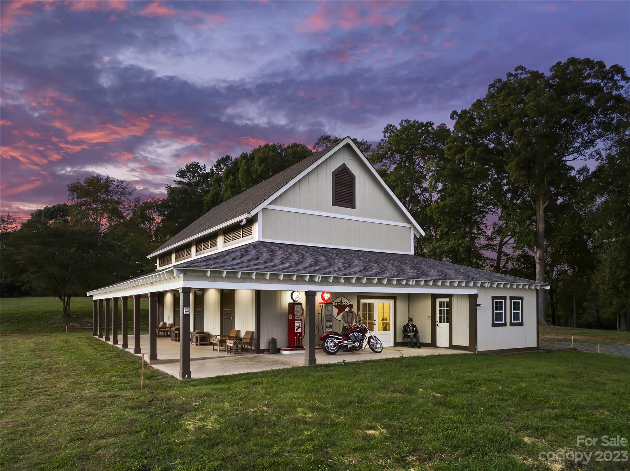 13500 Cabarrus Station Road Midland, NC 28107 - Photo 5 of 48 a front view of a house with a garden