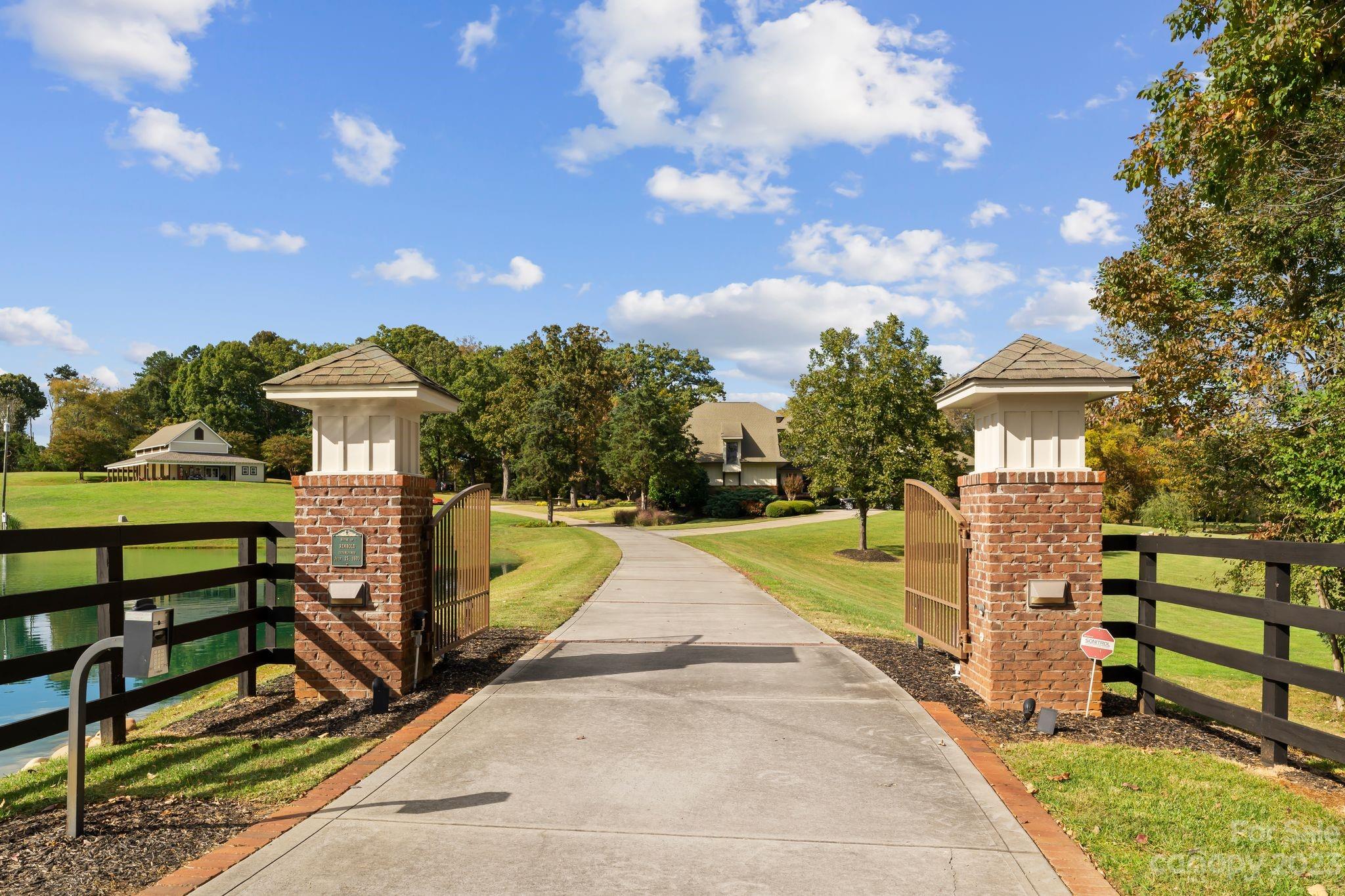 13500 Cabarrus Station Road Midland, NC 28107 - Photo 6 of 48 a view of a house with backyard and trees