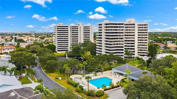 a view of a balcony with chairs